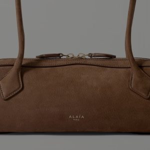 First came the return of the bowling bag. Now, its extra-elongated cousin, the East-West handbag, is making a comeback, too.