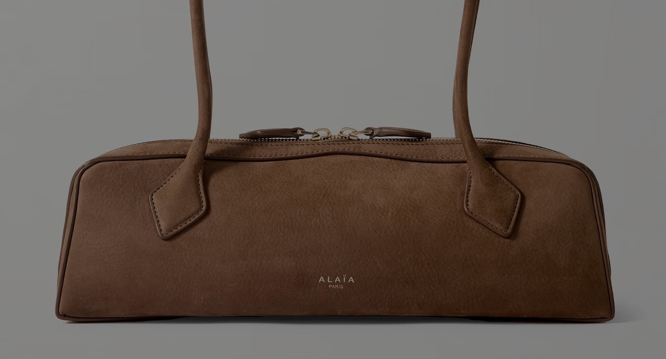 First came the return of the bowling bag. Now, its extra-elongated cousin, the East-West handbag, is making a comeback, too.